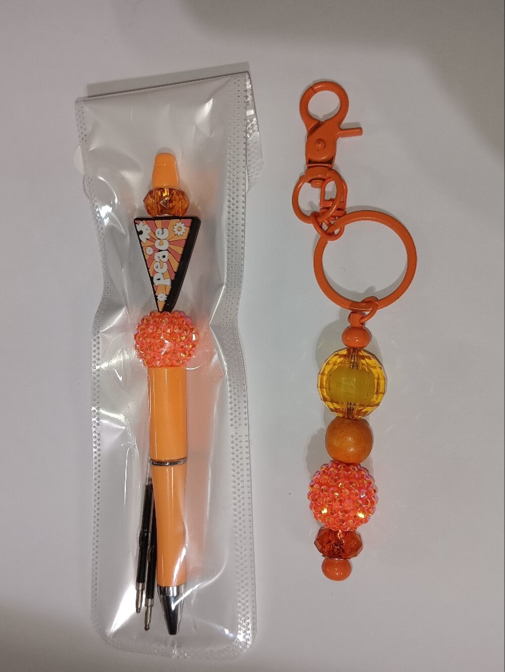 Source Unknown Peace Orange Beaded Keychain & Pen Set